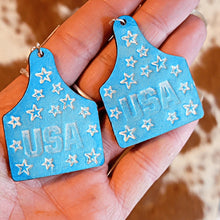 Load image into Gallery viewer, Baby Blue USA Cow Tag Leather Earrings - Designodeal
